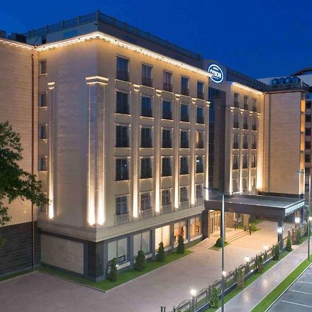 Orion Hotel Bischkek Exterior foto Hilton Prague