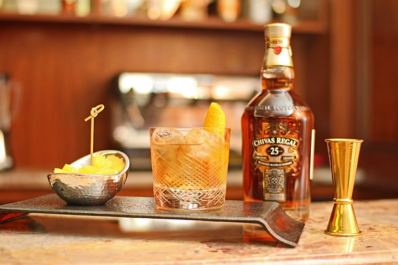 Orion Hotel Bischkek Exterior foto A bottle of 25 year old Chivas Regal