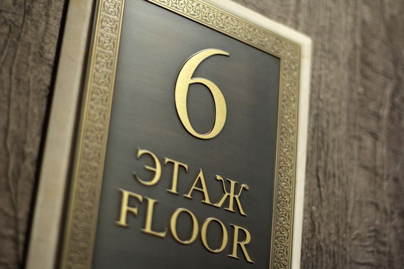 Orion Hotel Bischkek Exterior foto Floor sign