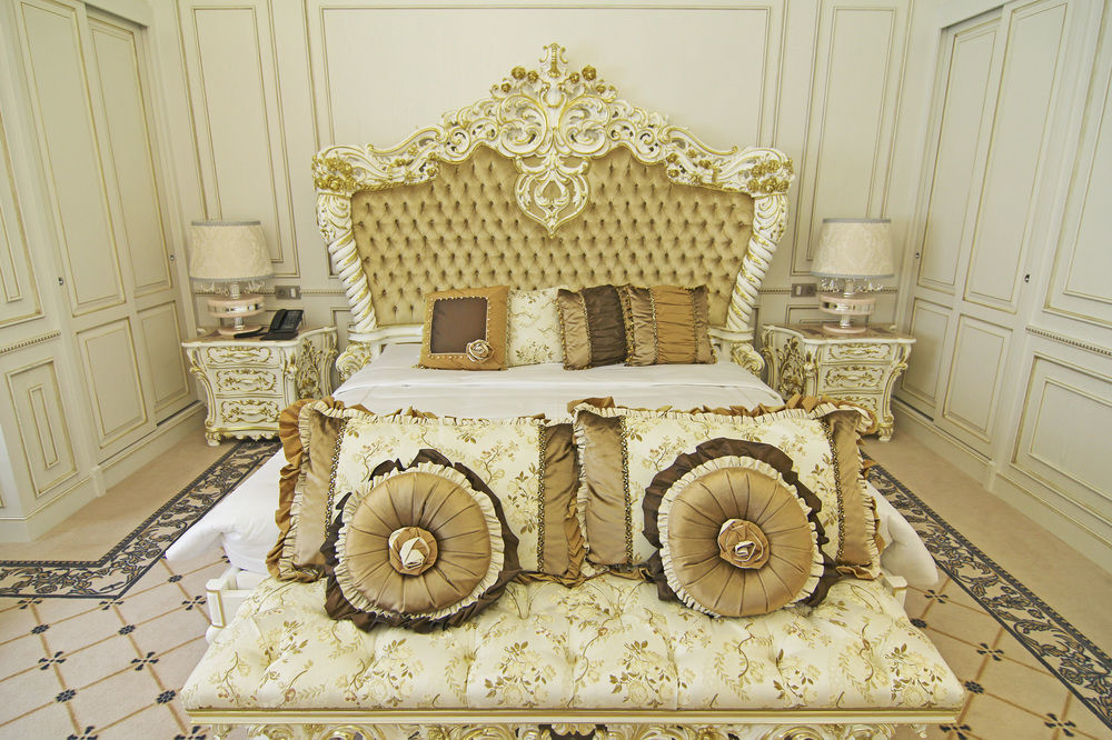 Orion Hotel Bischkek Exterior foto A bedroom in the Emirates Palace