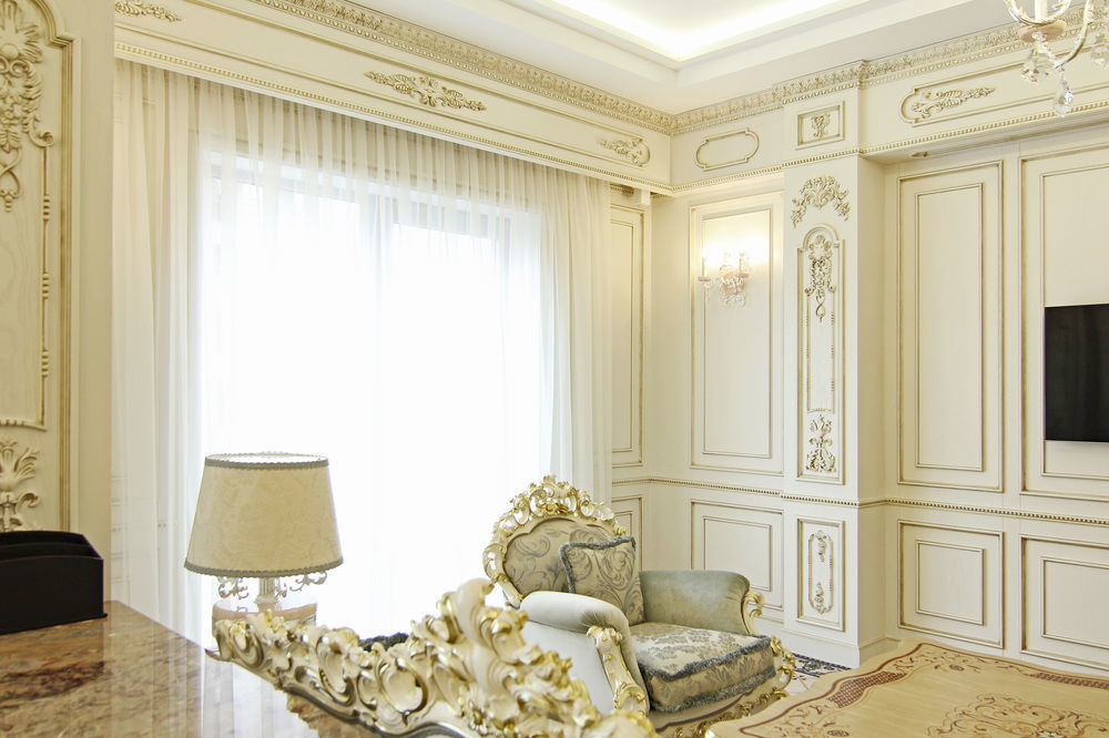 Orion Hotel Bischkek Exterior foto A room with a curtain