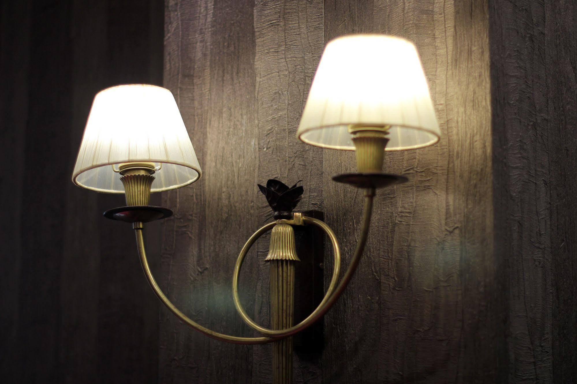 Orion Hotel Bischkek Exterior foto A wall light
